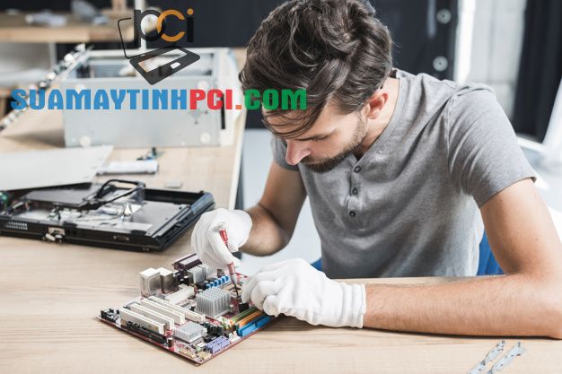 Premium Photo | Man repairing electronic circuit of computer